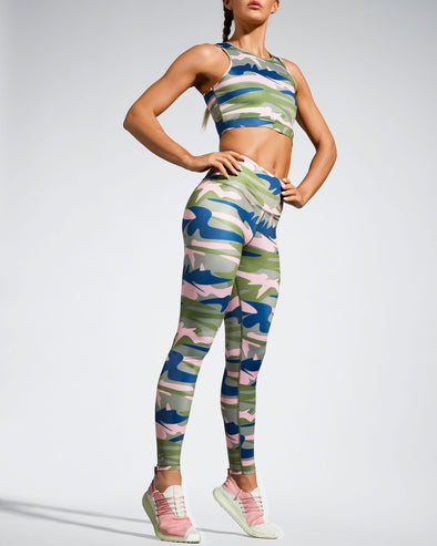 Ladies Camufarre Print Sustainable Gym Leggings. Featuring a one off camo activewear print created with a purpose by Scultura. Inspired by the ocean and designed to raise awareness of the environmental impact of single use plastic. Created with premium technical Italian fabric made with 100% regenerated yarn from recycled plastic bottles (rPET). Front view.