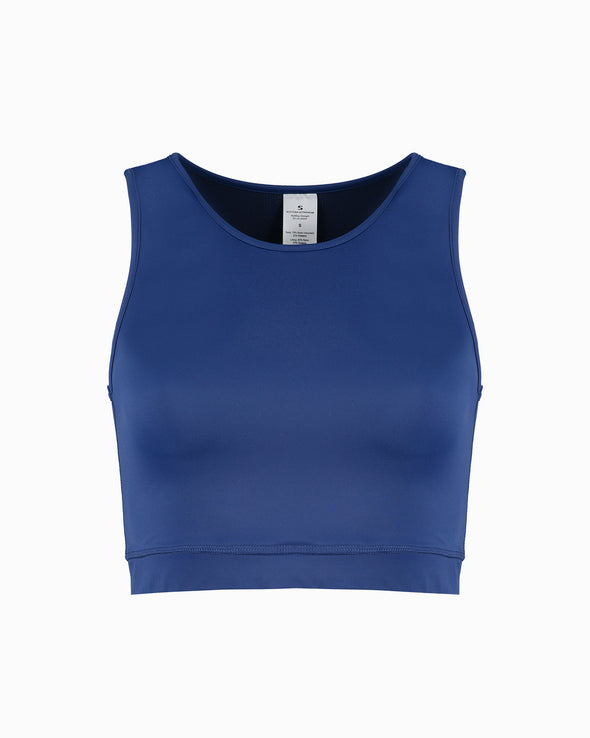 Front product shot of blue sustainable gym crop. Women's luxury gym wear that is made to last. Made in London with Econyl Fabric from recovered ocean fishing nets. 
