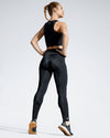 Black Debutto sustainable gym leggings. Full length Gym Legging. Women’s Sustainable Activewear made to last with ECONYL Regenerated Yarn.  Back view.