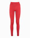 Full length red leggings. Debutto gym leggings are made with sustainable fabric created with ECONYL Regenerated Yarn. Designed and made in London, UK. Front view.