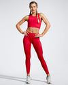 Red Debutto sustainable gym leggings. Full length Gym Legging. Sustainable Activewear made to last with ECONYL Regenerated Yarn.  Front view.
