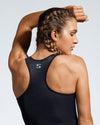 Sustainable gym top. The Energia is a full length racer back top. Sustainable Activewear made with ECONYL Regenerated Yarn. Designed and made in UK. Back view.