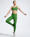 Green Debutto sustainable gym leggings. Full length Gym Legging. Women’s Activewear made to last with ECONYL Regenerated Yarn.  Front view.