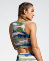 Camufarre Sustainable Sports Crop with racer back design. Featuring a one off camo activewear print created with a purpose by Scultura. Inspired by the ocean and designed to raise awareness of the environmental impact of single use plastic. Created with premium technical Italian fabric made with 100% regenerated yarn from recycled plastic bottles (rPET). Back View.