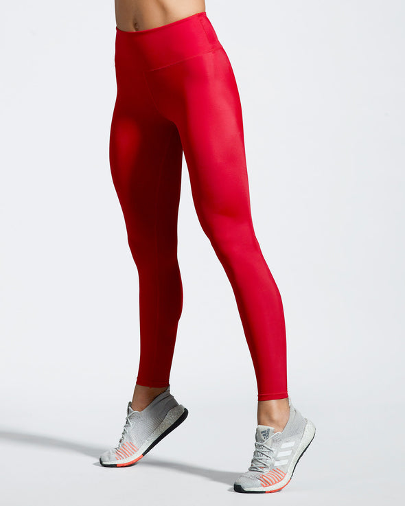 Red Gym Leggings made with sustainable fabric created with recovered fishing nets. Full length Sports Leggings in bright red. Sustainable activewear that's made to last in the UK.