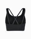 Product shot of black sustainable women’s sports bra. Women’s Activewear made to last with ECONYL Regenerated Yarn created with recovered fishing nets.  Back view.
