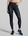 Sustainable gym leggings with Sienna print. Dark blue and burnt orange activewear print. Full length leggings for women.