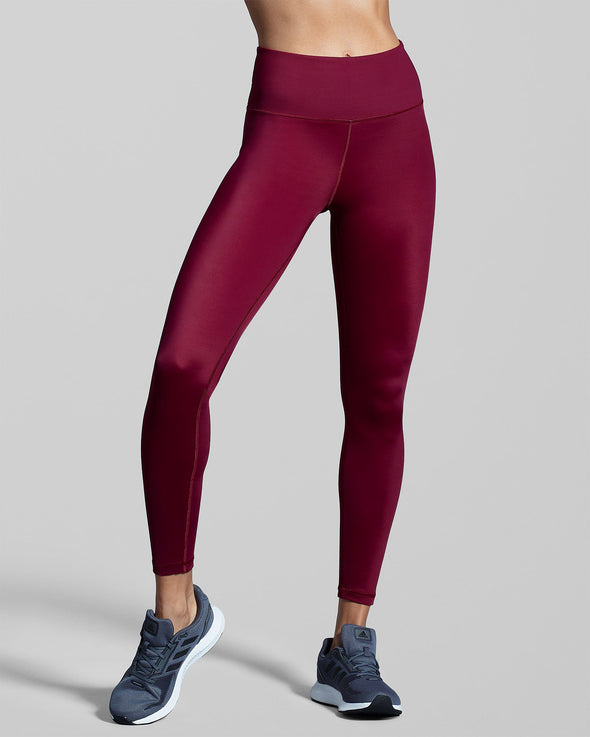 Sustainable berry red burgundy gym leggings . New Horizons activewear collection.